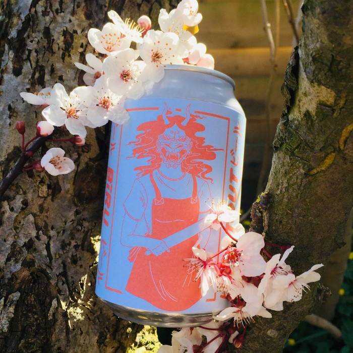 a photo of a beer can with a tough mom illustration on the label
