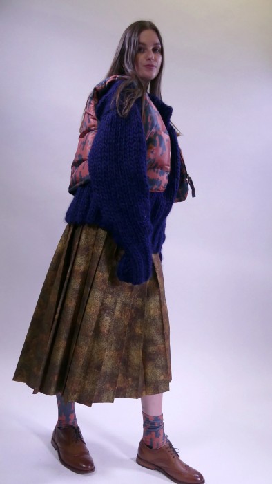 First look for the final collection, FIVE MPH, 2021. Includes a pleated skirt, nit jumper and quilted vest.