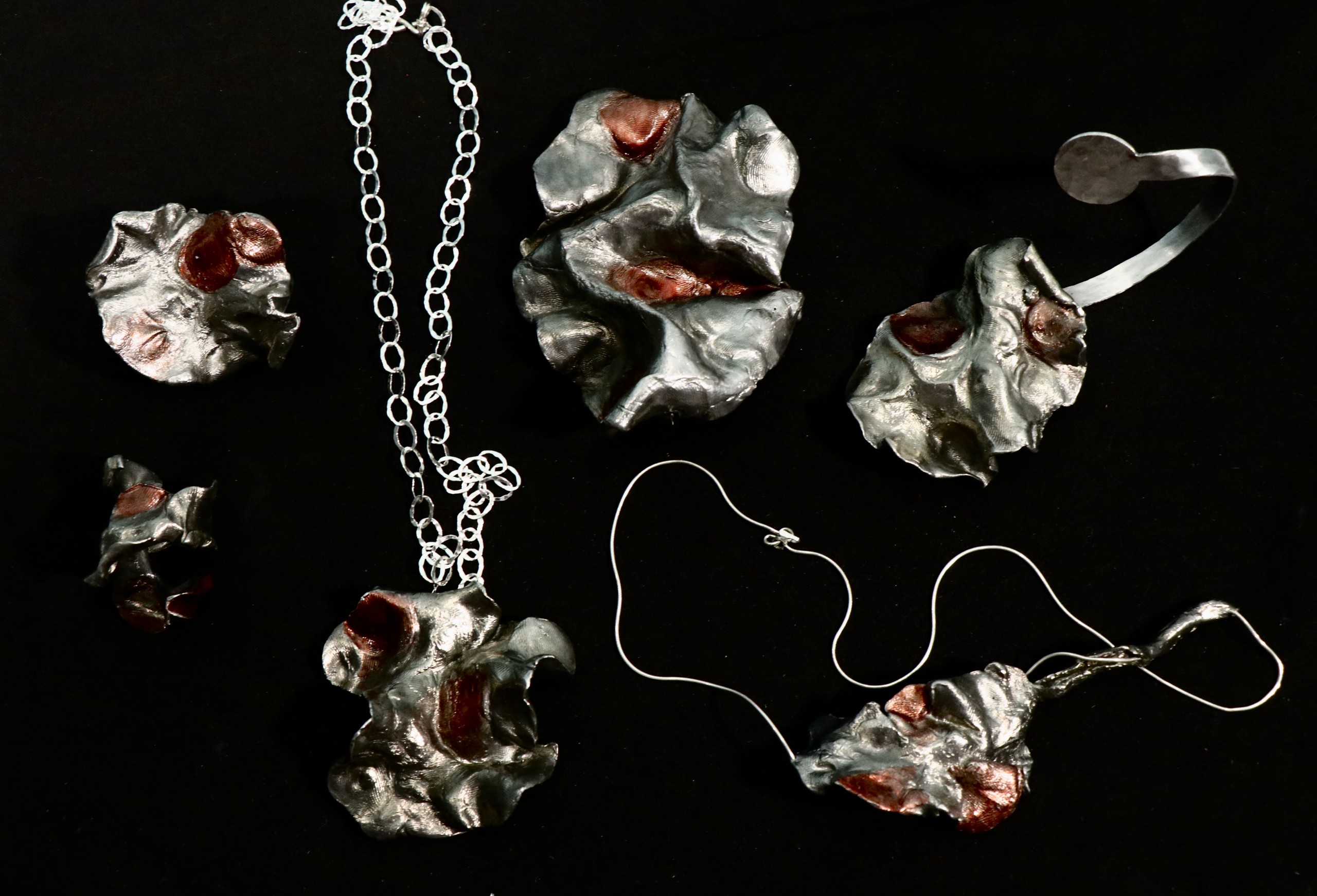 Tracing Touch Leaves a Trace, 2024. Silver and aluminium