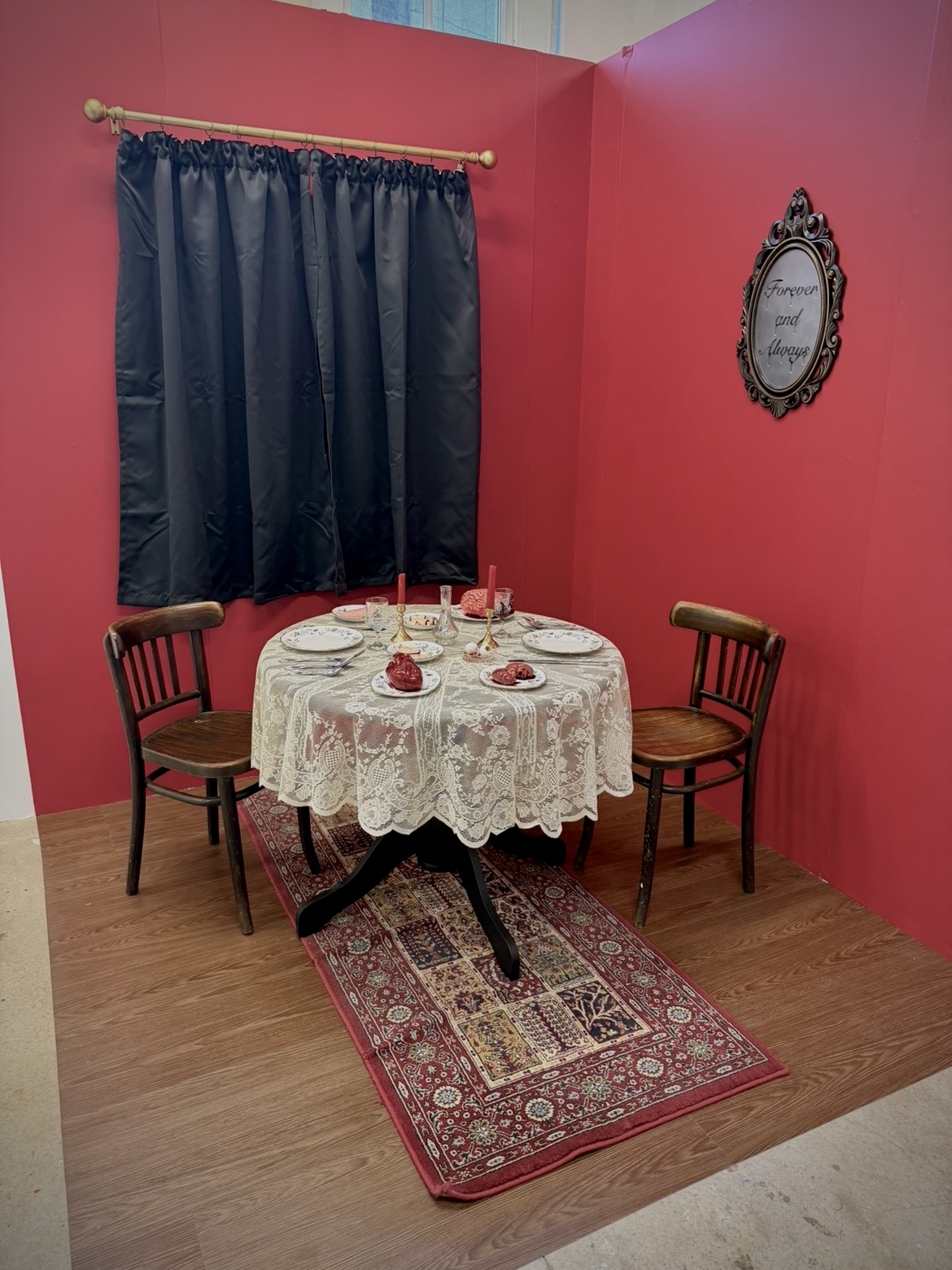 Dining table displaying sculptures of human organs and body parts