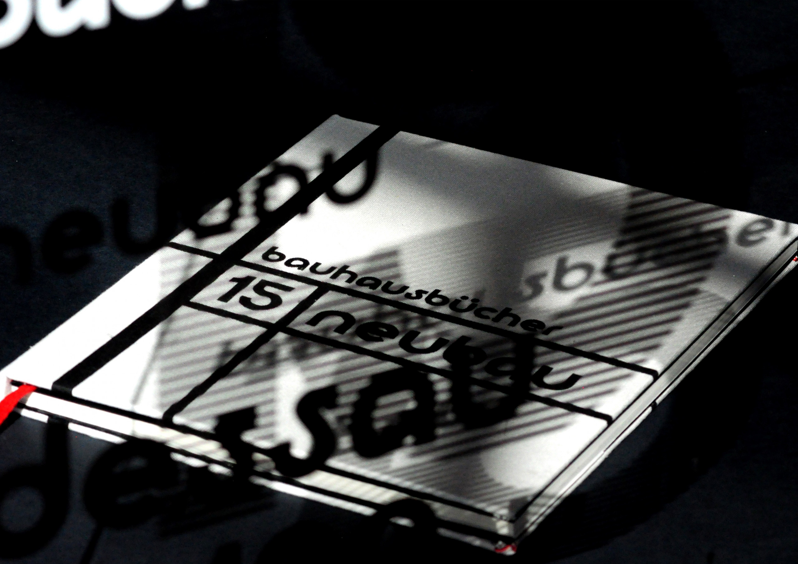 Bauhausbücher 15 photographed behind a Bauhausbücher 15 perspex sheet